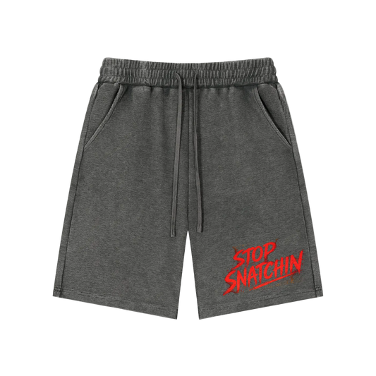 Gray shorts with red text 'Stop Snatching' on a white background